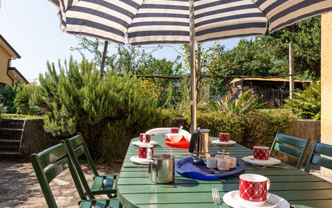 Carolina: Property, Patio, Umbrella, Outdoor Table, Table, Shade, Furniture, Building, Real Estate, House