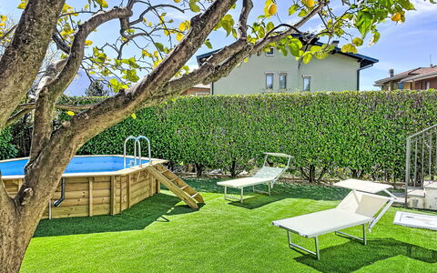 Villa Giulia: Grass, Garden, Lawn, Shade, Leisure, Landscaping, Artificial Turf, Backyard, Yard, Swimming Pool