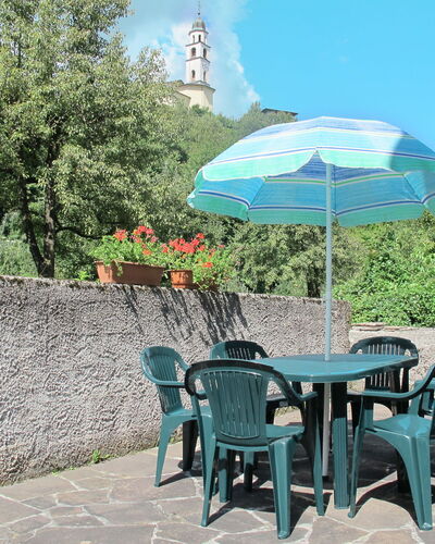 Casa al Mulino: Umbrella, Property, Building, Table, Furniture, Real Estate, Patio, Tourism, Shade, Vacation