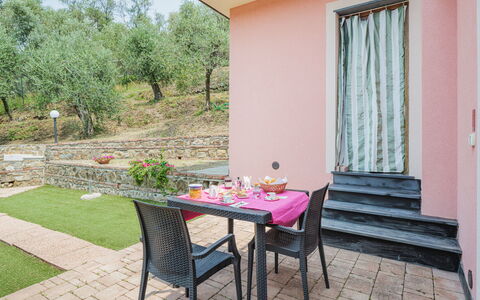 Villetta Linara: Furniture, Plant, Table, Property, Flower, Building, Chair, Leaf, Shade, Wood