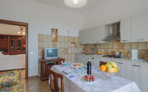 Del Freo: Table, Cabinetry, Property, Tableware, Chair, Lighting, Kitchen, Interior Design, Picture Frame, Countertop