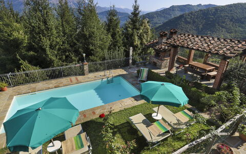 Carla (Blu150): Property, Sky, Nature, Tree, Azure, Building, Plant, Swimming Pool, Shade, Outdoor Furniture