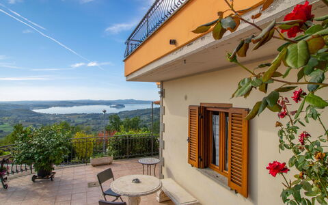 Casa Martina: Sky, Plant, Cloud, Property, Building, Flower, Window, Wood, Cottage, Shade