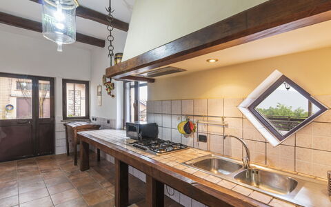 Colleflaviano: Property, Sink, Picture Frame, Countertop, Interior Design, Wood, Kitchen, Cabinetry, Houseplant, Flooring