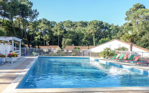 Les Mathes 100: Water, Plant, Property, Sky, Swimming Pool, Azure, Shade, Tree, Building, Outdoor Furniture