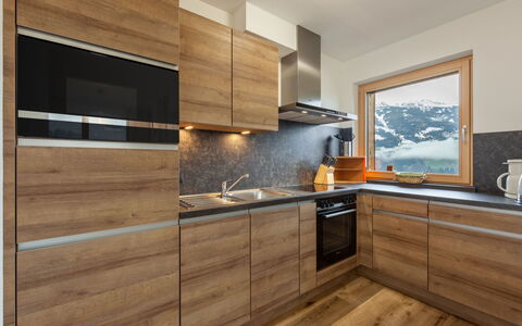 Stumm im Zillertal 647: Countertop, Cabinetry, Furniture, Room, Kitchen, Property, Interior Design, Hardwood, Wood Flooring, Floor