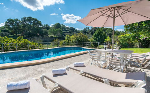 Son Femenia: Sky, Water, Cloud, Property, Umbrella, Azure, Swimming Pool, Sunlounger, Shade, Outdoor Furniture