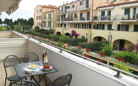 Cala Azzurra (Imp312): Property, Building, Real Estate, Apartment, House, Balcony, Mixed-Use, Residential Area, Condominium, Room