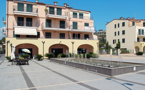 Cala Azzurra (Imp312): Sky, Building, Plant, Window, Urban Design, House, Condominium, Neighbourhood, Residential Area, Public Space