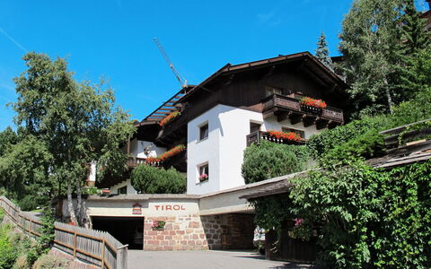 Ortisei St Ulrich 609: House, Property, Architecture, Building, Real Estate, Sky, Home, Tourism, Tree, Hill Station