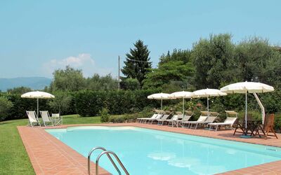 Pescia 631: Water, Sky, Plant, Swimming Pool, Cloud, Umbrella, Chair, Tree, Outdoor Furniture, Shade