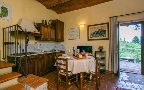 Greve in Chianti 651: Table, Furniture, Property, Picture Frame, Wood, Interior Design, Cabinetry, Chair, Building, Living Room