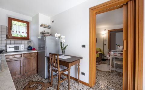 Villa Stelis: Table, Furniture, Cabinetry, Chair, Building, Wood, Drawer, Picture Frame, Interior Design, Chest Of Drawers