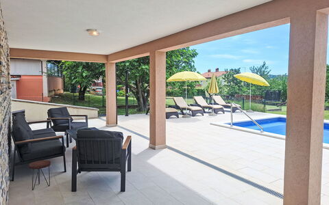 Marina: Wood, Flooring, Floor, Swimming Pool, Furniture, Outdoor Furniture, Composite Material, Shade, Resort, Chair