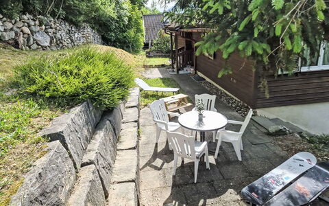 Crap Grisch: Garden, Cottage, Flagstone, Backyard, Yard, Landscaping, Walkway, Shade, Cobblestone, Outdoor Furniture