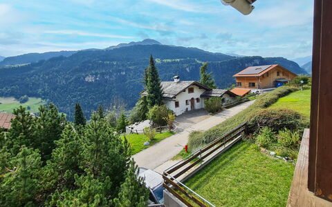 Crap Grisch: Sky, Cloud, Plant, Building, Mountain, Window, Highland, Tree, Slope, Land Lot