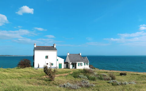 Les Roches: Sky, House, Blue, Property, Sea, Natural Landscape, Coast, Grass, Cottage, Coastal And Oceanic Landforms