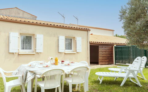 Brive 2: Sky, Property, Furniture, Table, Building, Window, Chair, Outdoor Table, Interior Design, Yellow