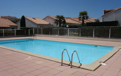 Vaux sur Mer 300: Water, Sky, Swimming Pool, Building, Azure, Rectangle, Shade, Plant, Tree, House