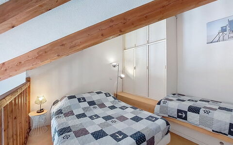 Vaux sur Mer 550: Bed, Interior Design, Bedroom, Floor, Flooring, Wood, Ceiling, Room, Furniture, Bedding