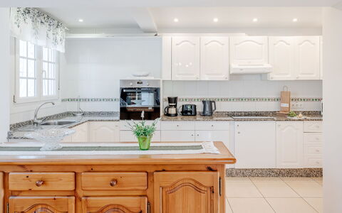Heringklee: Kitchen, Countertop, Interior Design, Cabinetry, Furniture, Kitchen Appliance, Flooring, Wood, Major Appliance, Floor
