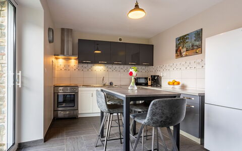 La Lucerie: Furniture, Property, Countertop, Cabinetry, Table, Wood, Interior Design, Chair, Flooring, Kitchen