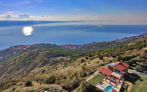 Kilo: Property, Sky, Table, Wood, Shade, Floor, Outdoor Furniture, Chair, Flooring, Wood Stain