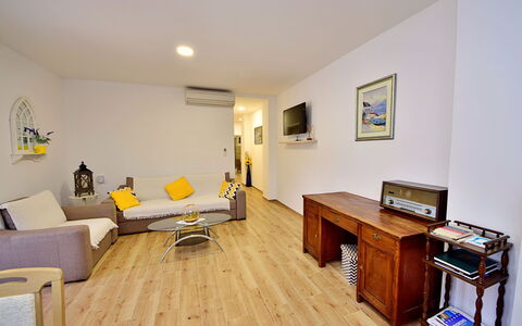 Baba Nevenka: Furniture, Table, Building, Comfort, Wood, Living Room, Flooring, Picture Frame, Floor, Couch