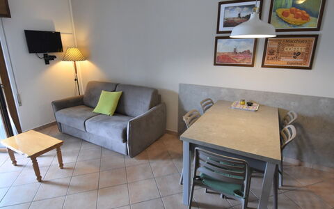 Lago D'Idro 650: Property, Furniture, Picture Frame, Table, Couch, Interior Design, Lighting, Comfort, Living Room, Architecture