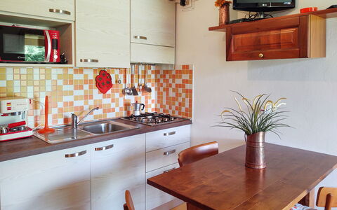 Gravedona 743: Cabinetry, Furniture, Property, Table, Countertop, Wood, Interior Design, Kitchen, Lighting, Tap