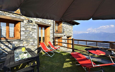 Gravedona 744: Furniture, Sky, Window, Shade, Outdoor Furniture, House, Cottage, Grass, Cloud, Landscape
