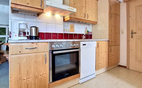 Eusch: Kitchen, Kitchen Appliance, Countertop, Major Appliance, Flooring, Wood, Cabinetry, Interior Design, Furniture, Floor