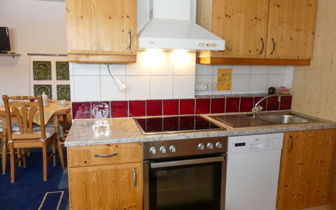 Eusch: Countertop, Cabinetry, Furniture, Kitchen Sink, Kitchen, Kitchen Stove, Kitchen Appliance, Wood, Tap, Building
