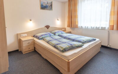 Kappl 822: Furniture, Property, Comfort, Azure, Wood, Building, Bed Frame, Textile, Interior Design, Window