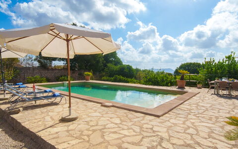 Sa Rota: Sky, Cloud, Water, Plant, Swimming Pool, Outdoor Furniture, Shade, Arecales, Tree, House