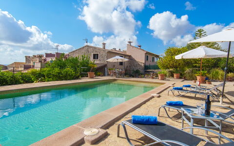 Sa Rota: Cloud, Water, Sky, Plant, Building, Property, Blue, Swimming Pool, Azure, Chair