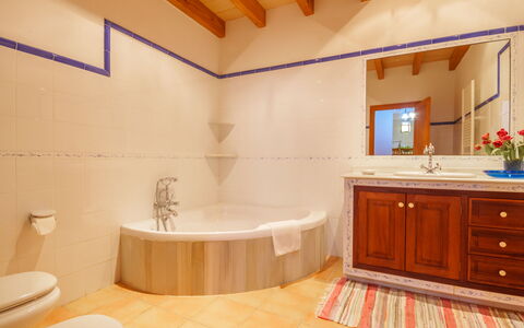 Sa Rota: Bathtub, Cabinetry, Plumbing Fixture, Property, Countertop, Tap, Building, Comfort, Bathroom, Bathroom Cabinet