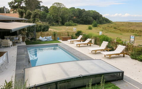 Indigo-Vue Mer et Piscine Chauffée: Water, Plant, Cloud, Property, Sky, Swimming Pool, Outdoor Furniture, Shade, Sunlounger, Tree