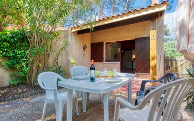 Lacanau 100: Furniture, Plant, Property, Table, Chair, Azure, Building, Wood, Outdoor Furniture, Outdoor Table