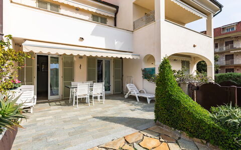 Cristina: Plant, Building, Property, Window, Interior Design, Chair, House, Sky, Shade, Residential Area