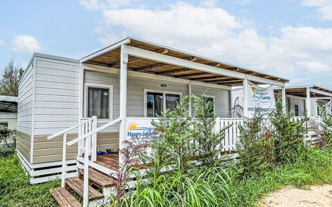 Rosolina Mare 620: Sky, Cloud, Plant, Ecoregion, Building, Window, Land Lot, Wood, Cottage, Grass