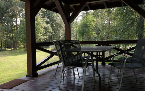 Zatylówka Dom Na Wyspie: Property, Tree, Room, Botany, House, Table, Furniture, Pavilion, Building, Home