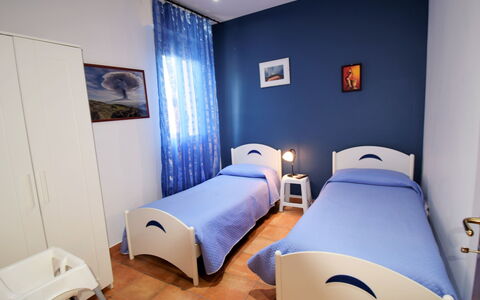 Etna View: Room, Bedroom, Blue, Furniture, Bed, Property, Interior Design, Bed Sheet, Wall, Building