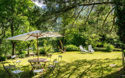 Villa Biino: Plant, Furniture, Table, Natural Landscape, Shade, Tree, Outdoor Table, Chair, Outdoor Furniture, Grass