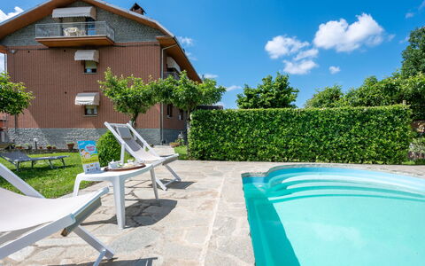Ca' D'Gnese: Sky, Plant, Building, Furniture, Cloud, Azure, Shade, Swimming Pool, Outdoor Furniture, Tree