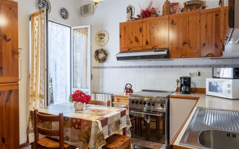 Degli Aranci (Imp385): Room, Furniture, Kitchen, Property, Countertop, Building, Interior Design, Cabinetry, House, Floor