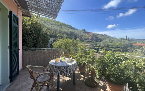 Casa dei Nonni (Imp425): Cloud, Sky, Plant, Furniture, Building, Flowerpot, Chair, Wood, Table, Door