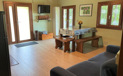 Baita Lavu': Picture Frame, Couch, Table, Wood, Building, Window, Living Room, Interior Design, Flooring, Floor