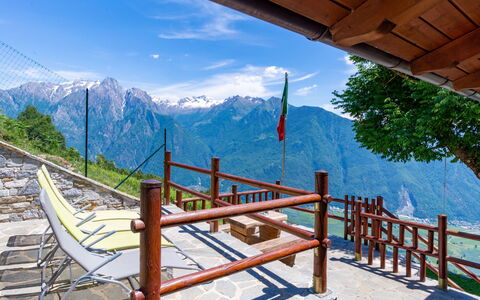 La Tana del Lupo: Sky, Cloud, Property, Mountain, Shade, Wood, Tree, Fence, Architecture, Biome