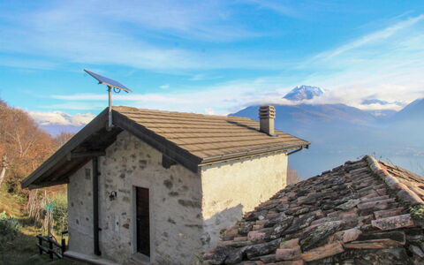 Cascina Ulivi: Sky, Cloud, Mountain, Plant, Wood, Building, Highland, Tree, House, Window